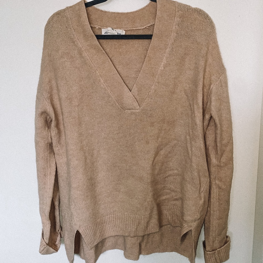 Tan sweater.